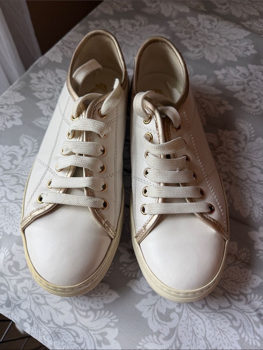 TODS Cream White Leather Sneakers with Gold Trim